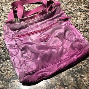 Used Coach purple purse.